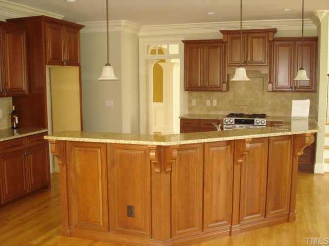 7611 Devere Court Raleigh, NC 27613 - Photo 9 of 12 TERRIFIC KITCHEN WITH ALL THE BELLS AND WHISTLES! PLENTY OF ROOM TO ENTERTAIN IN THIS KITCHEN!