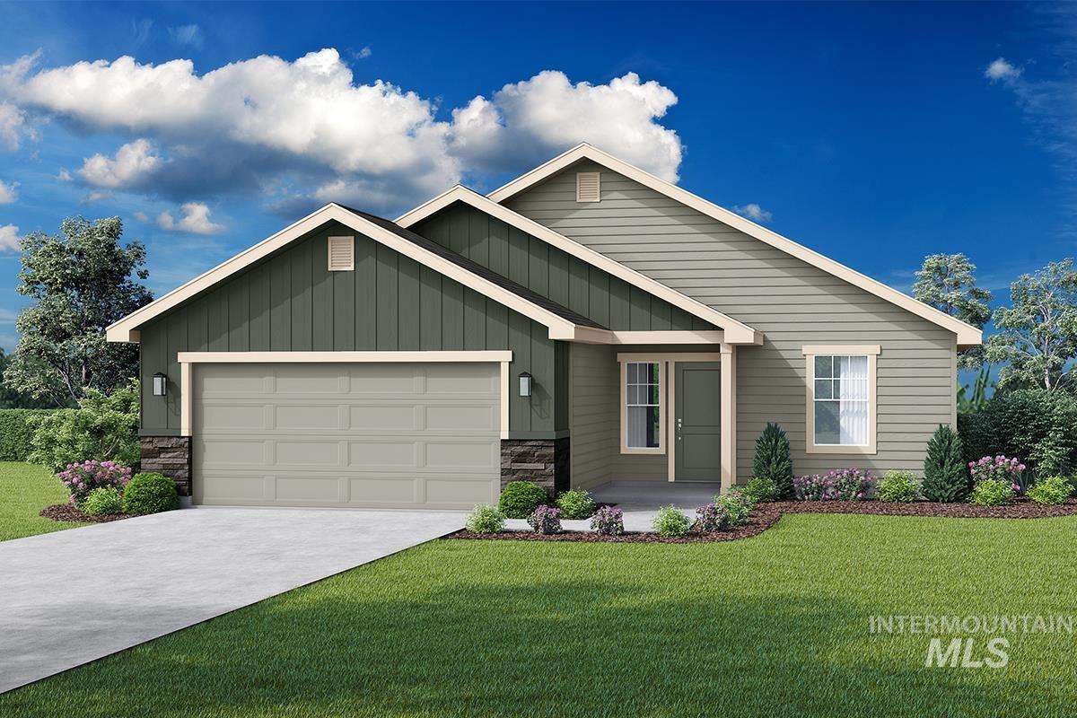 View of front facade featuring stone siding, concrete driveway, a garage, a front lawn, and covered porch