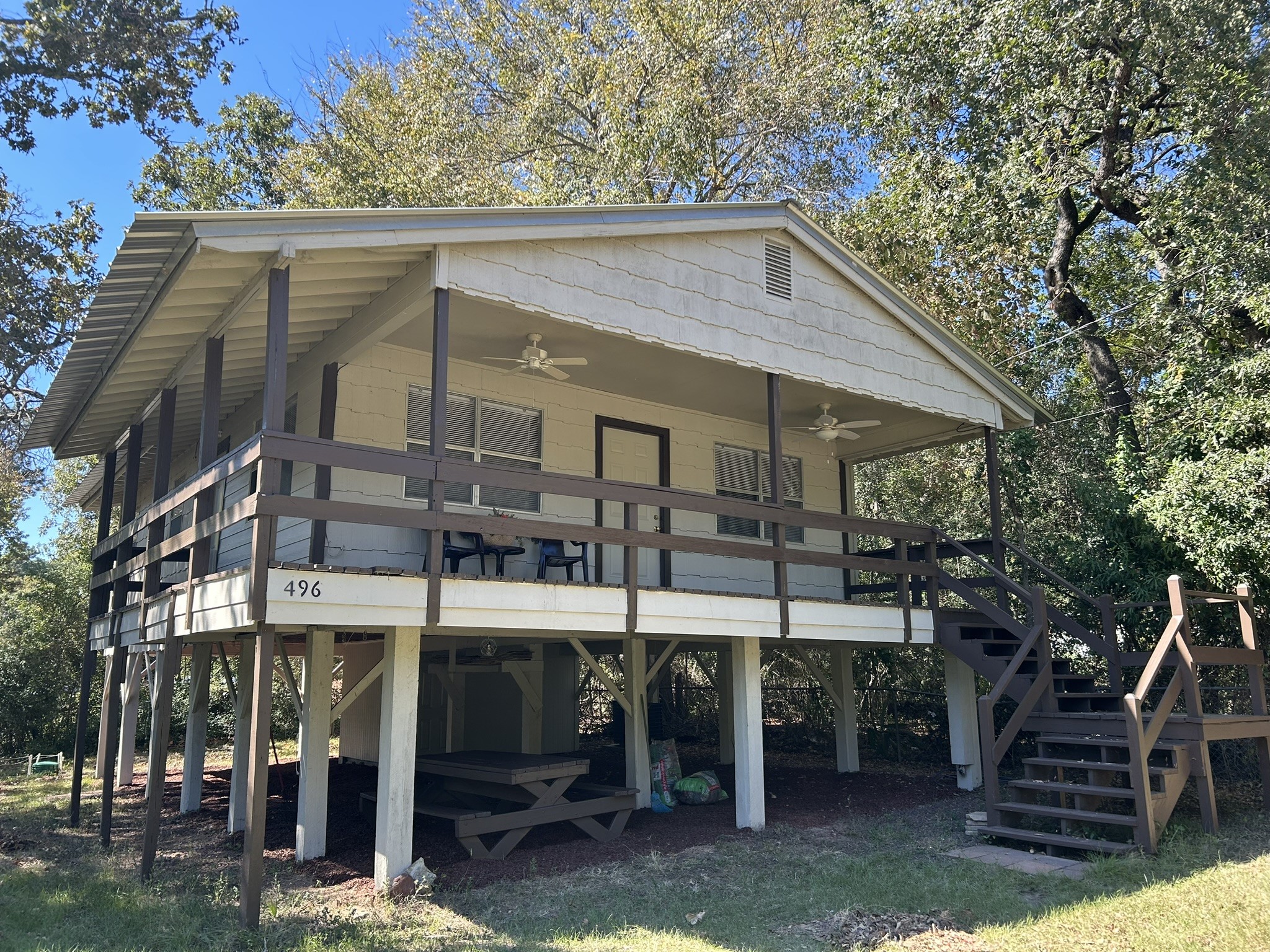 496 Campground Road Trinity, TX 75862 - Photo 14 of 22 a view of a house with a yard