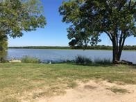 496 Campground Road Trinity, TX 75862 - Photo 16 of 22 a view of a lake