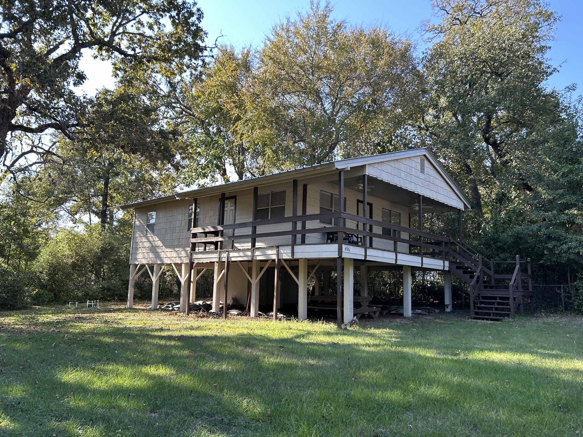 496 Campground Road Trinity, TX 75862 - Photo 5 of 22 a view of a house with a backyard