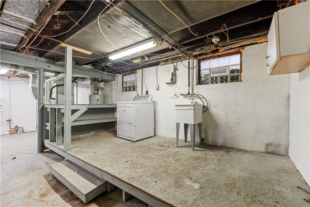 1306 Broadway Avenue McKees Rocks, PA 15136 - Photo 24 of 33 a utility room with dryer and washer