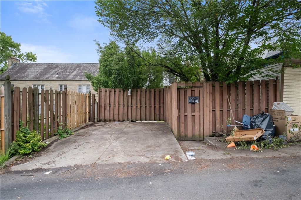 1306 Broadway Avenue McKees Rocks, PA 15136 - Photo 33 of 33 a view of outdoor space with patio and wooden fence