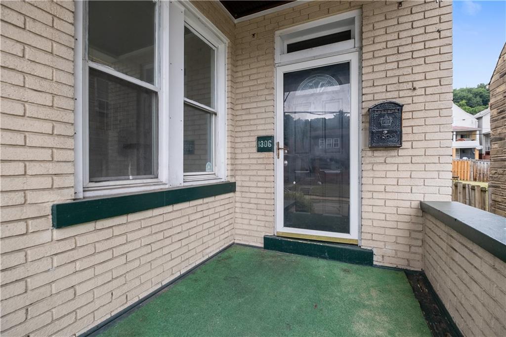 1306 Broadway Avenue McKees Rocks, PA 15136 - Photo 4 of 33 a view of front door of house
