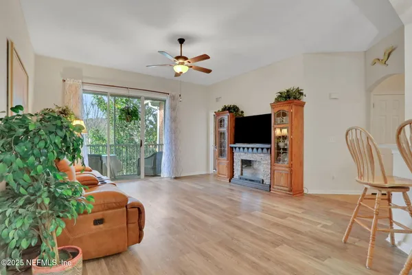 a view of kitchen and dining area with furniture