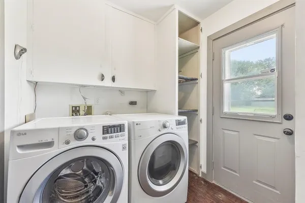 a view of washer and dryer in a utility room