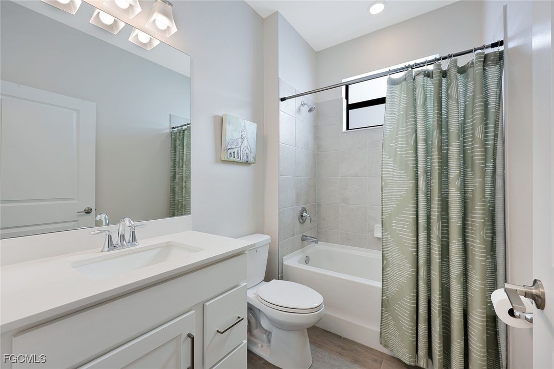 11087 Canopy Loop Fort Myers, FL 33913 - Photo 20 of 48 a bathroom with a sink toilet and shower
