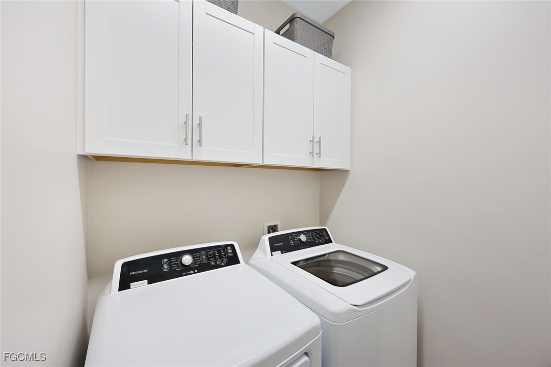 11087 Canopy Loop Fort Myers, FL 33913 - Photo 24 of 48 a utility room with dryer and washer