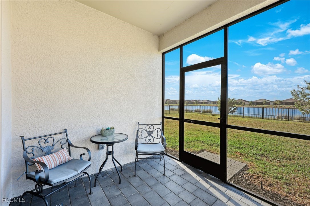 11087 Canopy Loop Fort Myers, FL 33913 - Photo 26 of 48 a view of a room with a large window and chair