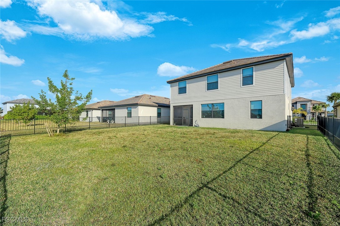 11087 Canopy Loop Fort Myers, FL 33913 - Photo 28 of 48 a house view with a garden space