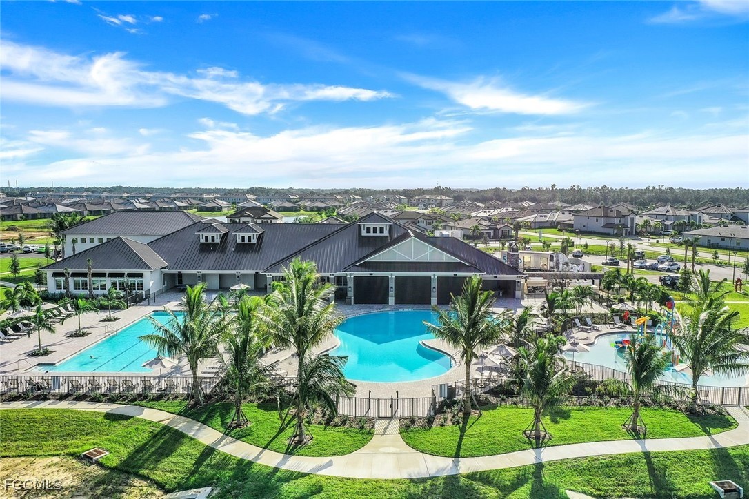 11087 Canopy Loop Fort Myers, FL 33913 - Photo 29 of 48 a view of a garden with a table and chairs
