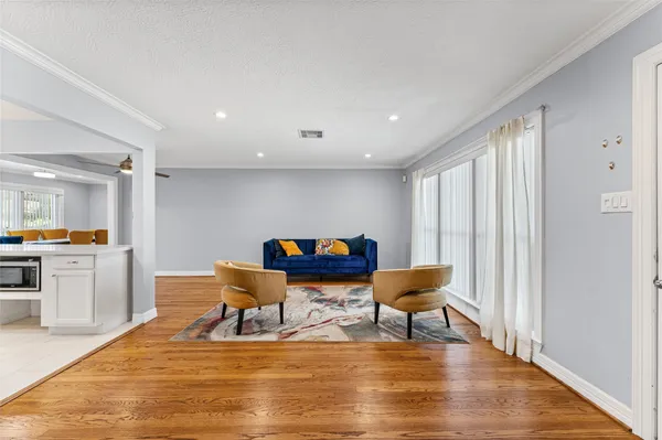 a living room with furniture and a table