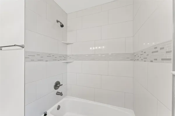 a bathroom with a bathtub