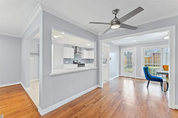 a view of a kitchen from the hallway