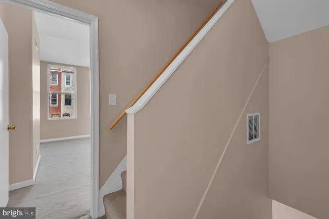 a view of entryway with stairs