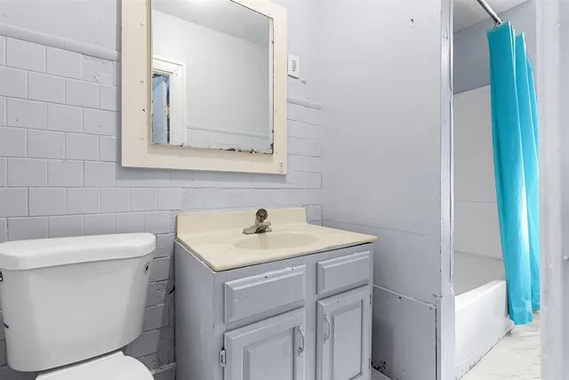 a bathroom with a sink and a toilet