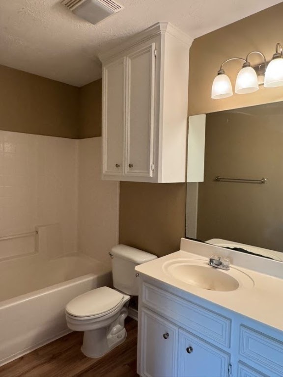 1809 Richmond Avenue Bryan, TX 77802 - Photo 7 of 12 a bathroom with a sink a toilet and bathtub