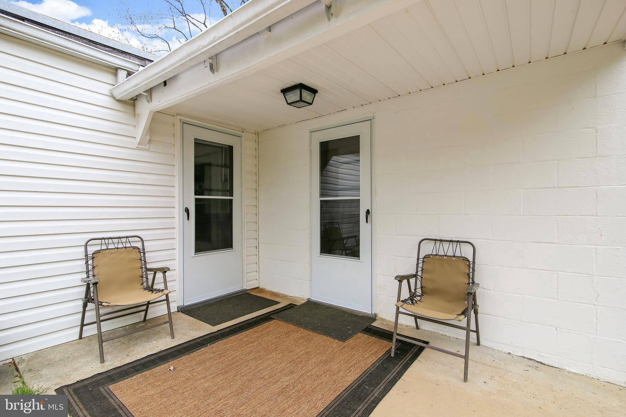 7734 Edgewood Church Road Frederick, MD 21702 - Photo 14 of 32 Patio with entrance to kitchen and master bedroom