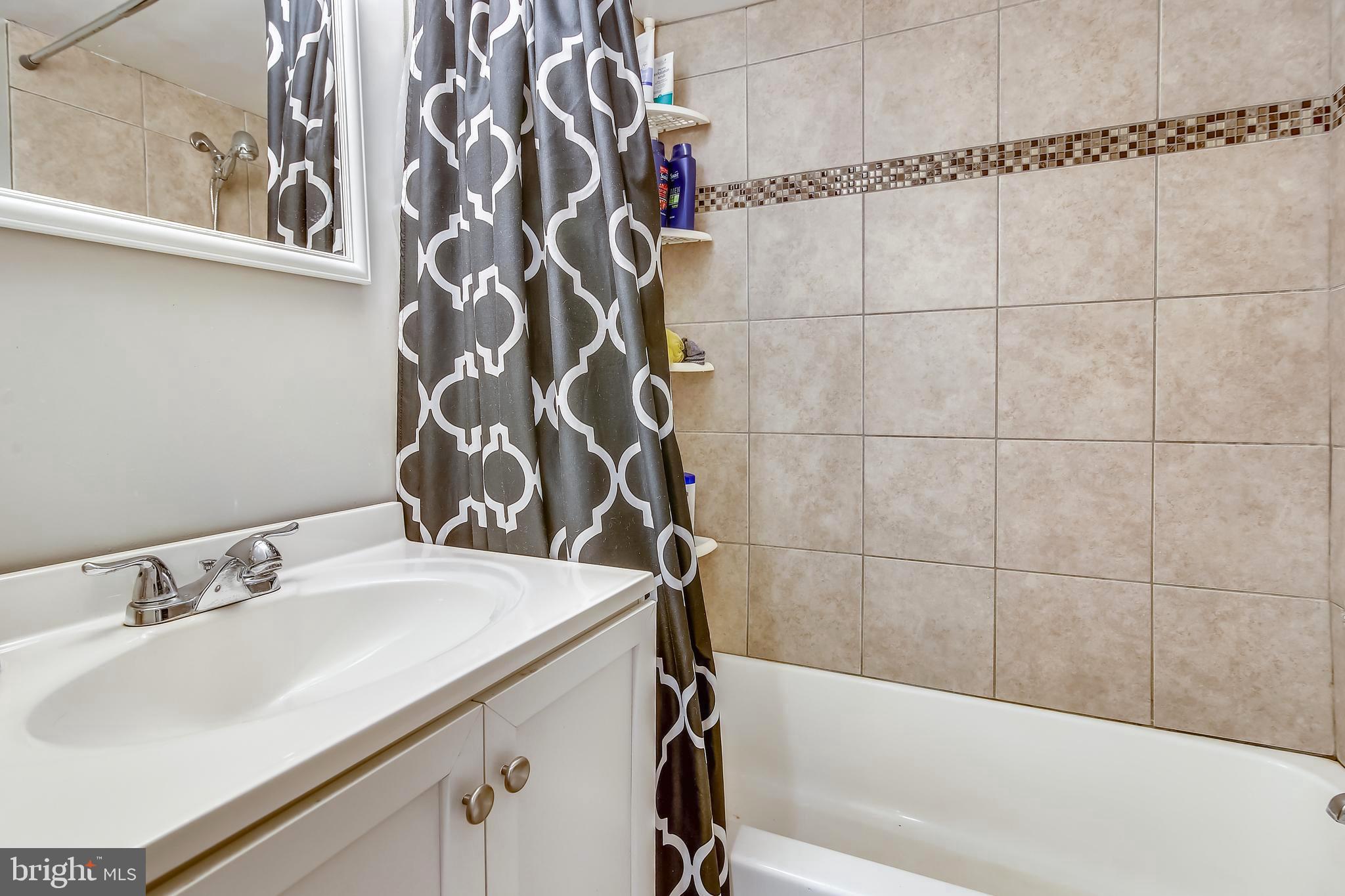 7734 Edgewood Church Road Frederick, MD 21702 - Photo 5 of 32 Updated full bathroom with ceramic tile