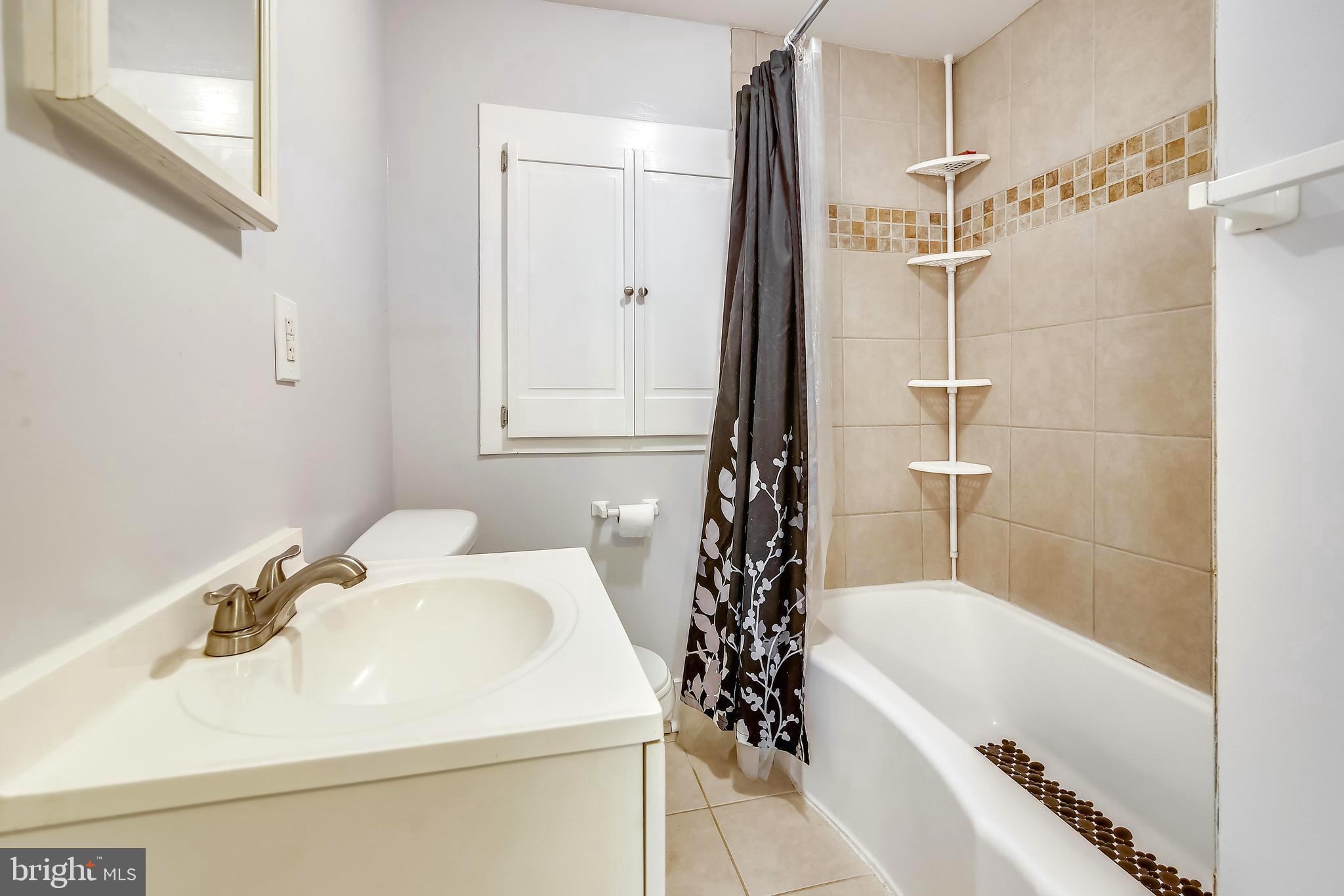 7734 Edgewood Church Road Frederick, MD 21702 - Photo 7 of 32 Updated bathroom with refinished cast iron tub!