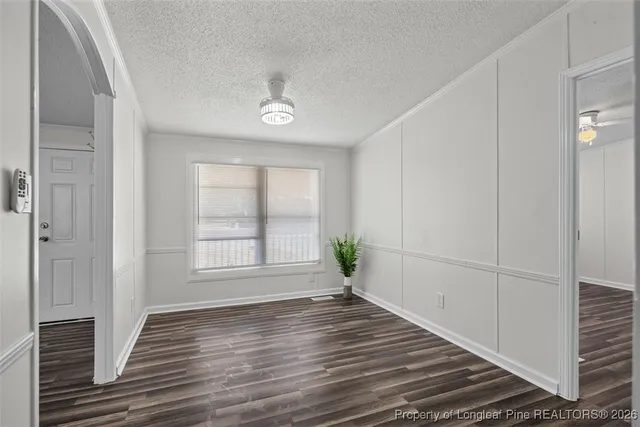 a view of a livingroom from a hallway