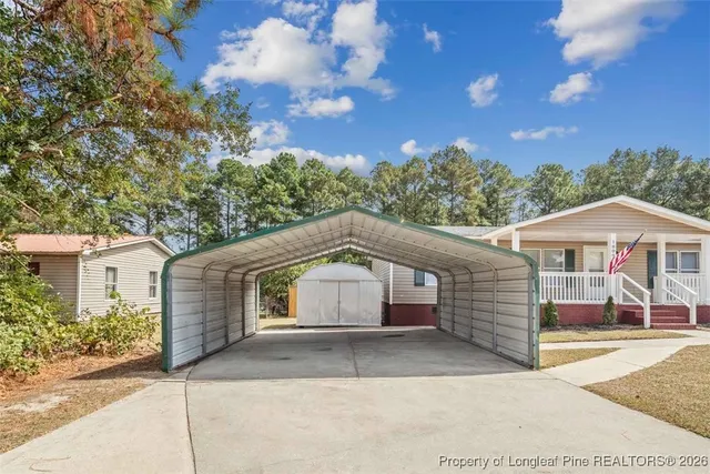 a bathroom with a granite countertop sink and bathtub