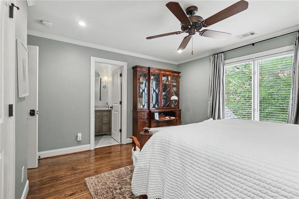 2375 Massey Lane Decatur, GA 30033 - Photo 40 of 88 a bedroom with a bed and a chandelier