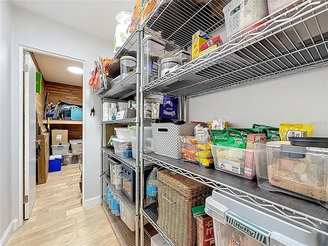 a bedroom with bed and a window