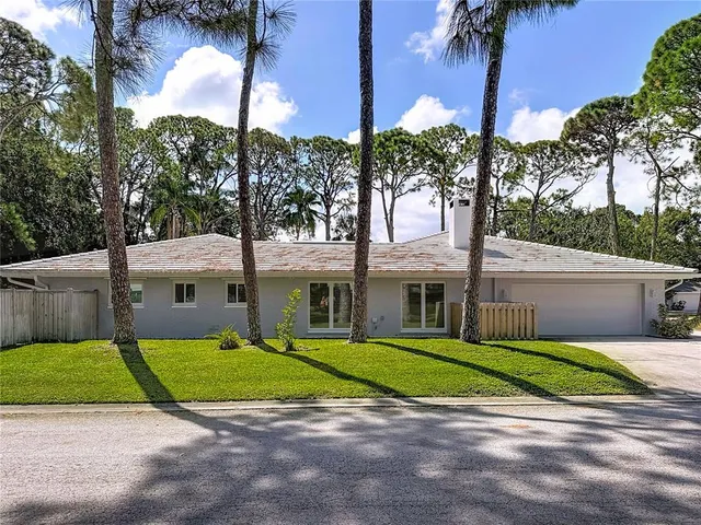 a view of a house with swimming pool