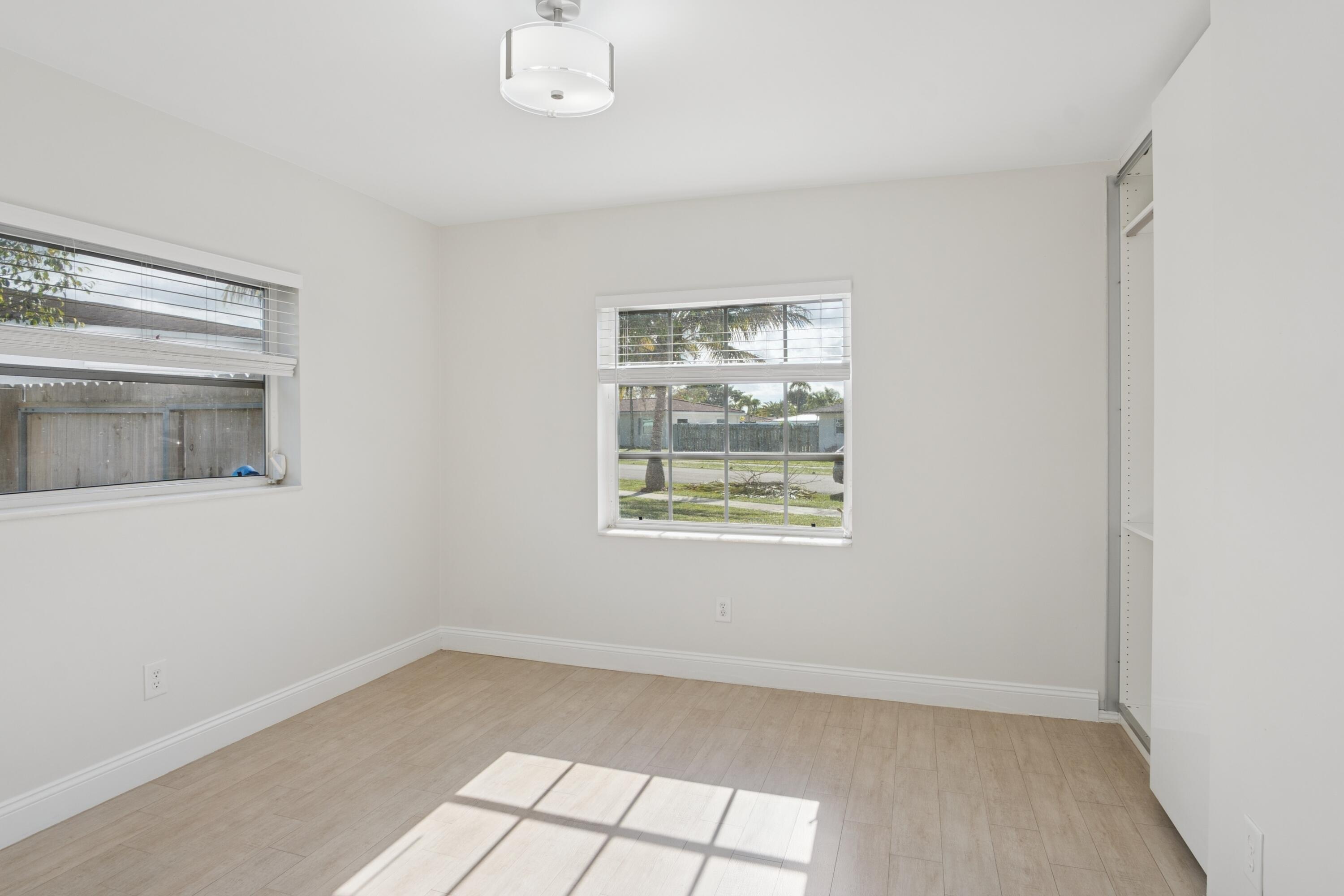 4971 Ataman Street Boca Raton, FL 33428 - Photo 23 of 35 an empty room with a window