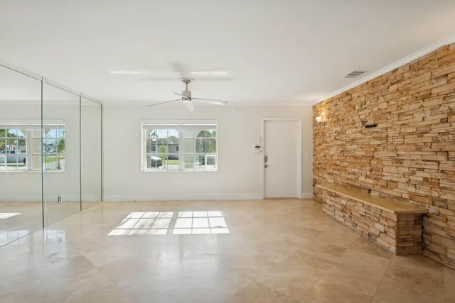 a view of empty room with windows