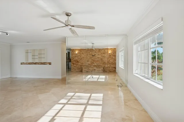a view of kitchen with furniture and wooden floor