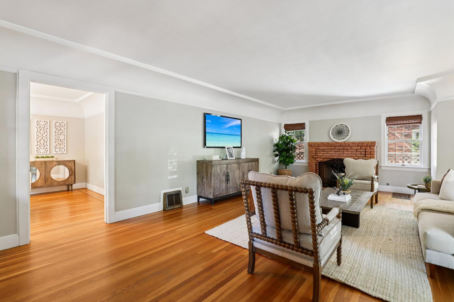 2200 2nd Avenue Sacramento, CA 95818 - Photo 12 of 69 a living room with furniture and wooden floor