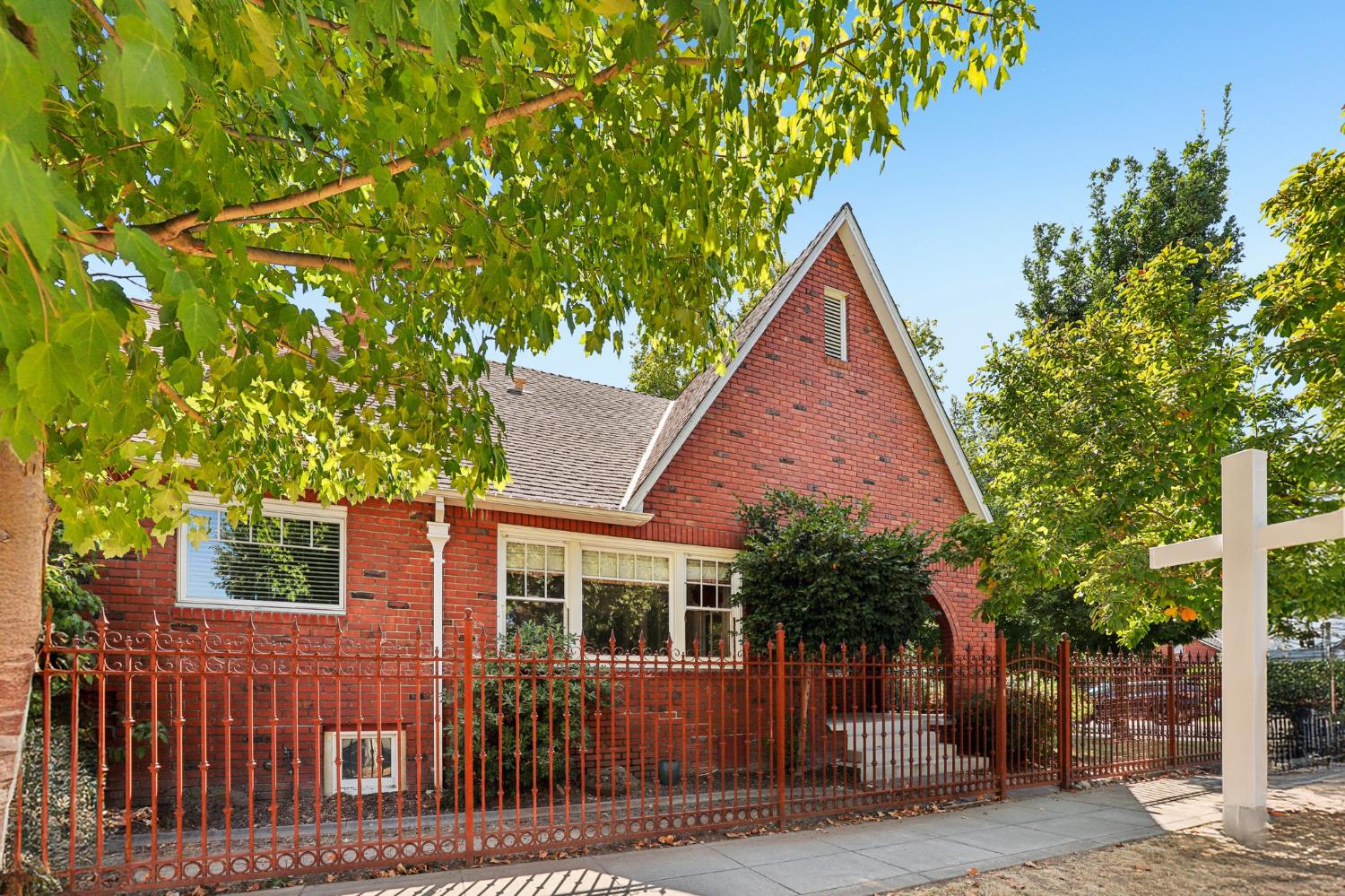2200 2nd Avenue Sacramento, CA 95818 - Photo 2 of 69 a view of house with a tree and a yard