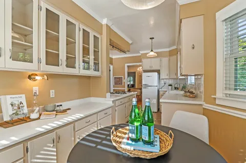 a bedroom with a bed and a window with outer view