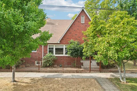 a view of a house with a small yard
