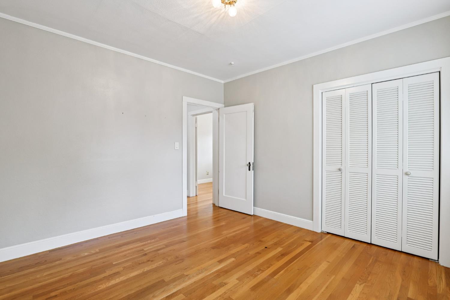 2200 2nd Avenue Sacramento, CA 95818 - Photo 47 of 69 a view of an empty room with wooden floor