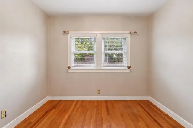 a picture of a wall with a white wall and a picture