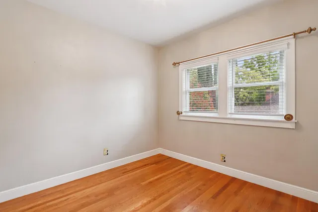 a picture of a bathroom with a shower