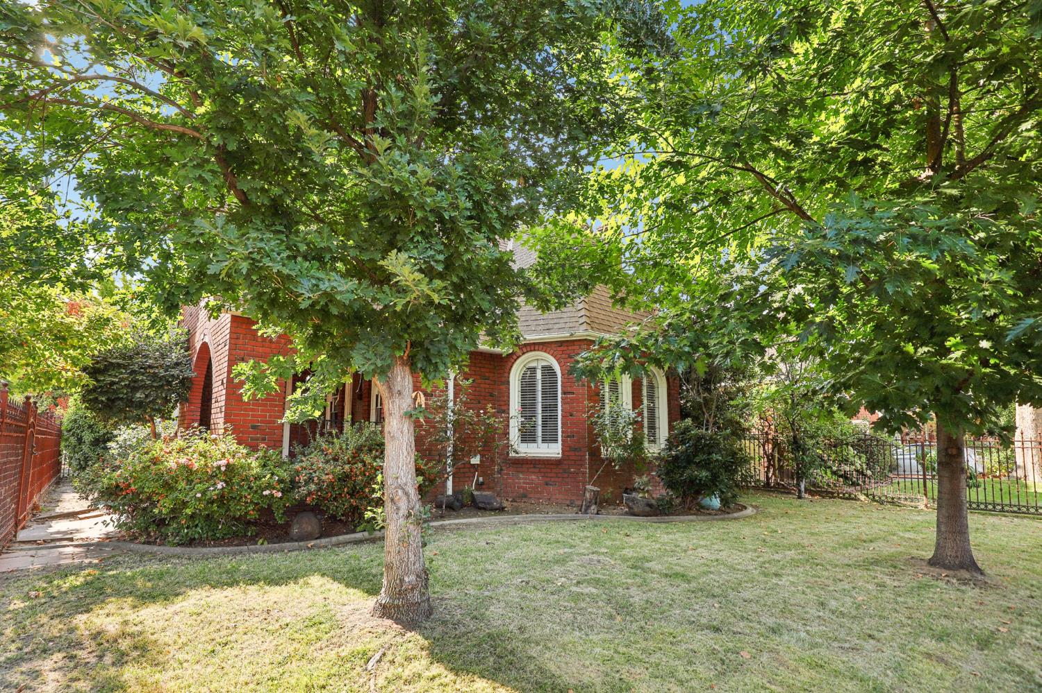 2200 2nd Avenue Sacramento, CA 95818 - Photo 7 of 69 a front view of a house with garden