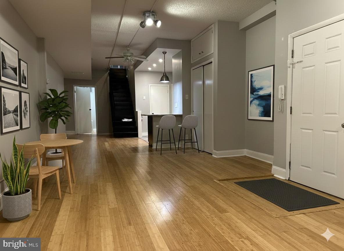 114 North 3rd Street, Unit 2 Philadelphia, PA 19106 - Photo 2 of 9 a view of a room with wooden floor and furniture