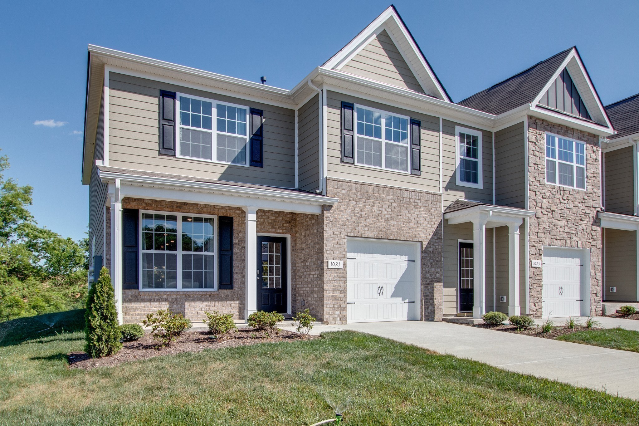 909 Shorttail Lane Lebanon, TN 37090 - Photo 1 of 28 a front view of a house with a yard and garage