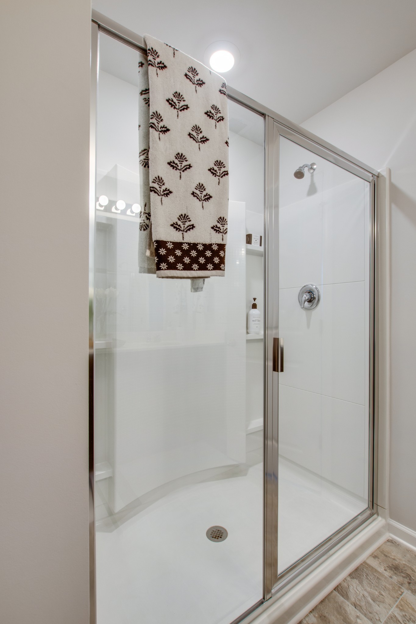 909 Shorttail Lane Lebanon, TN 37090 - Photo 23 of 28 a bathroom with a glass shower door