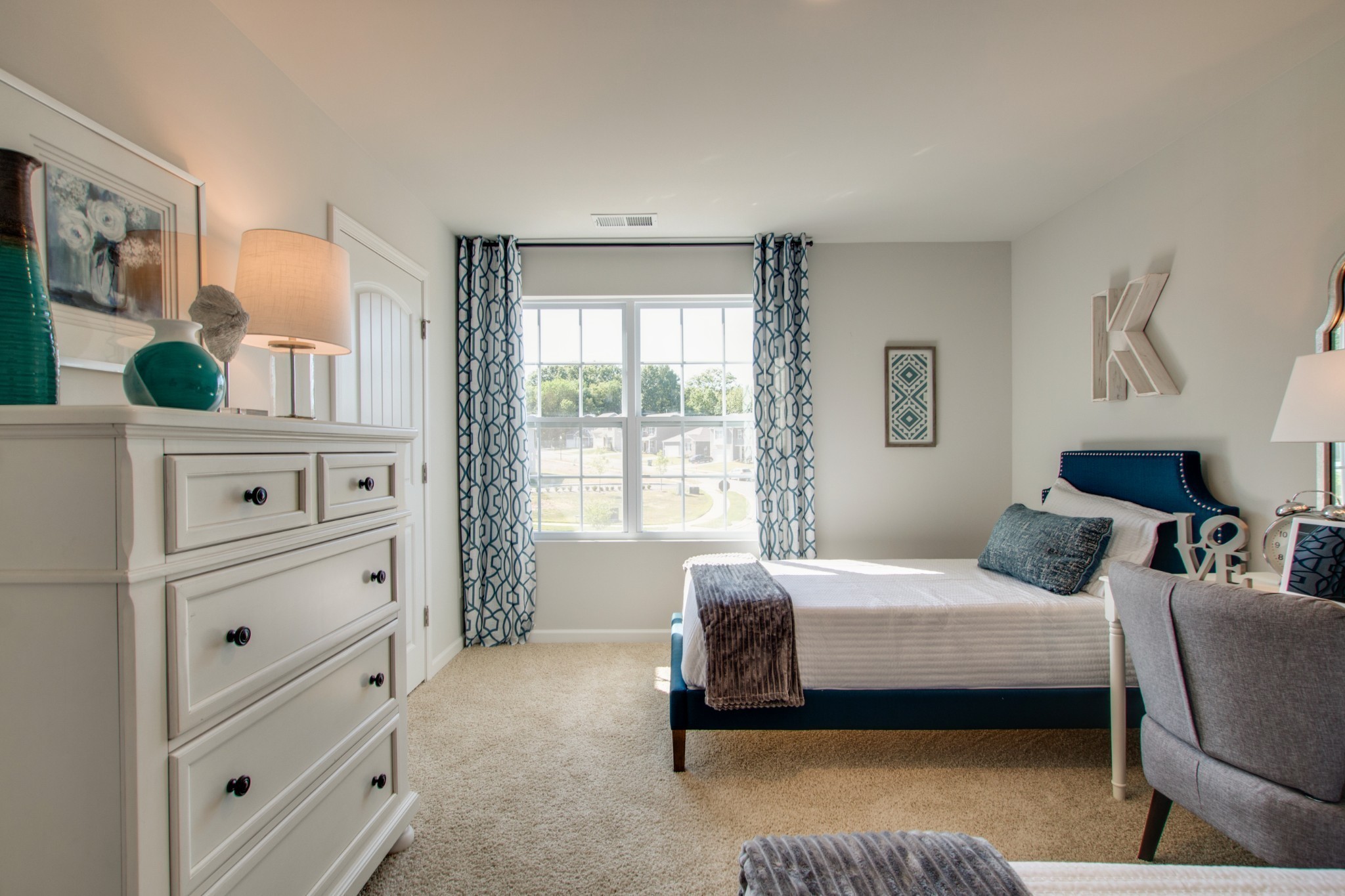 909 Shorttail Lane Lebanon, TN 37090 - Photo 28 of 28 a bedroom with a bed and a window