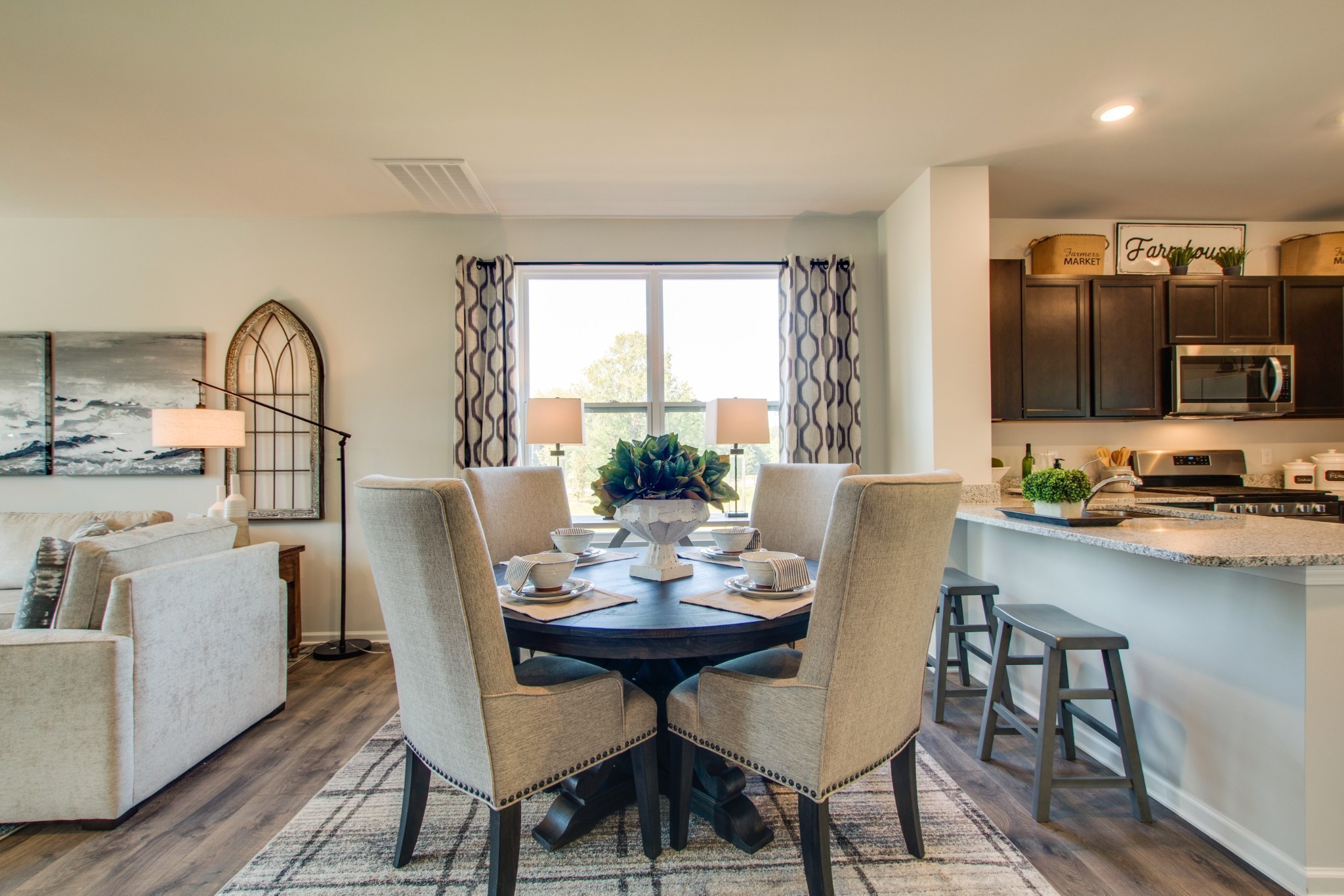 909 Shorttail Lane Lebanon, TN 37090 - Photo 7 of 28 a view of a dining room with furniture and a window