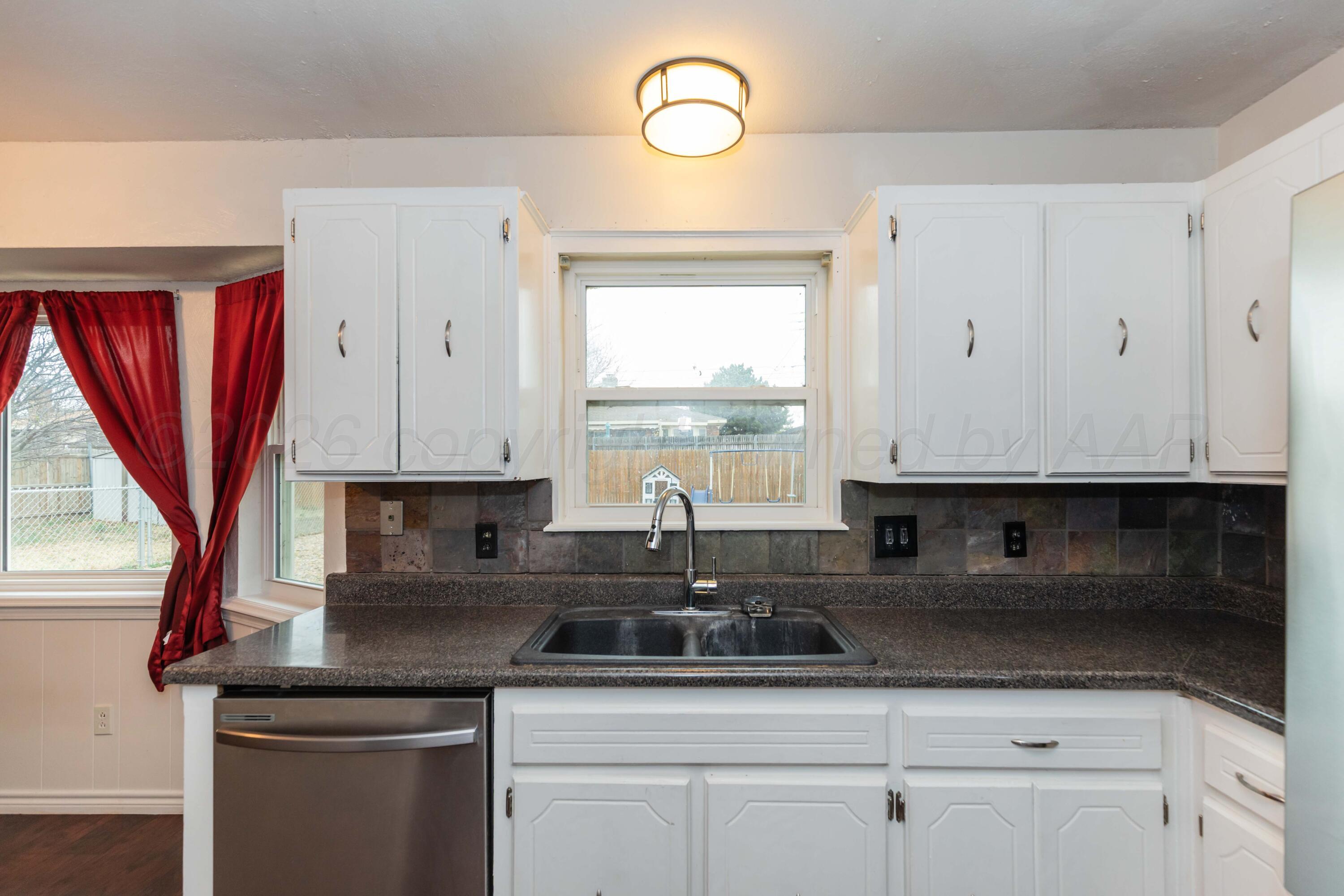 4202 Scotty Drive Amarillo, TX 79110 - Photo 10 of 30 KITCHEN VIEW 3