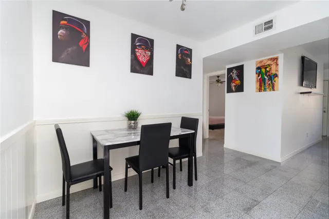 a view of a dining room with furniture