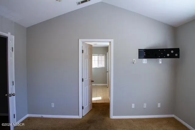 a view of an empty room and window