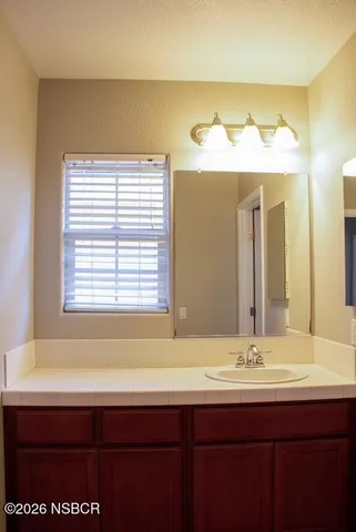 a bathroom with a sink and a bathtub