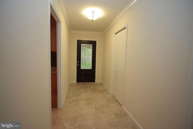 11322 Myrtle Lane Reston, VA 20191 - Photo 2 of 24 a view of hallway with closet and a window
